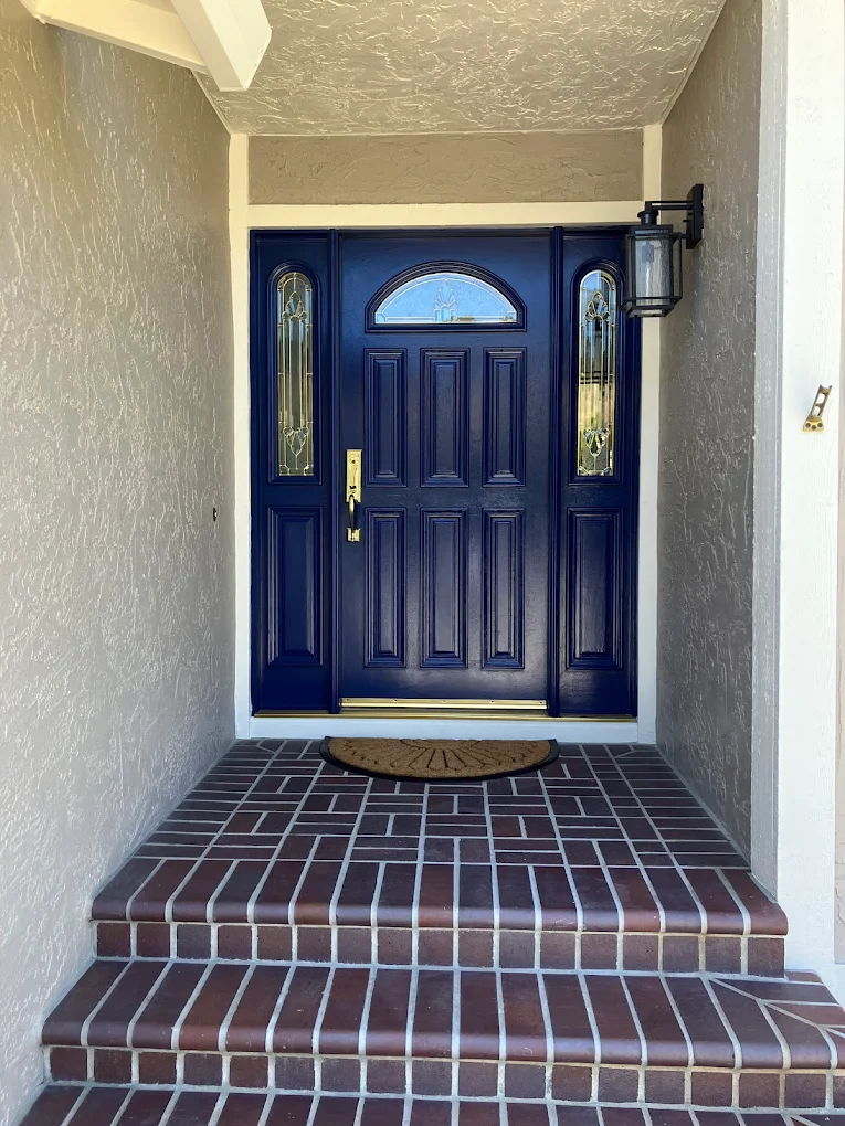 Painted entry door and interior wall detail